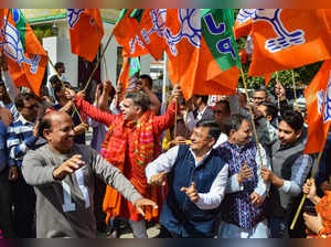 Jammu: J & K BJP chief Ravinder Raina along with party workers celebrates the pa...
