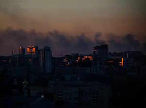 Smoke rises after shelling near Kyiv