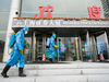 China stocks slump on coronavirus spread, weakening outlook