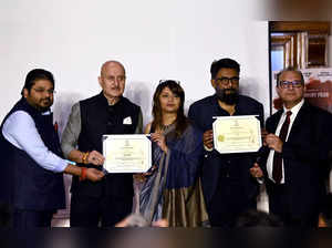 New Delhi, Mar 14 (ANI): Bollywood actor Anupam Kher, director Vivek Agnihotri, ...