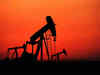 Oil holds near $100 as Ukraine talks, demand concerns limit gains