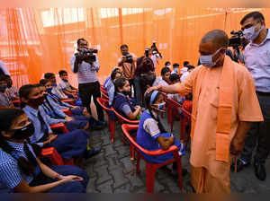 Lucknow, Mar 16 (ANI): Uttar Pradesh CM-designate Yogi Adityanath interacts with...