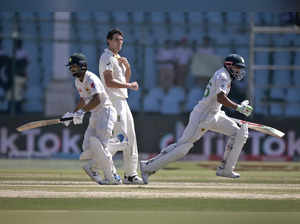 Pakistan's Abdullah Shafique, left, and Babar Azam