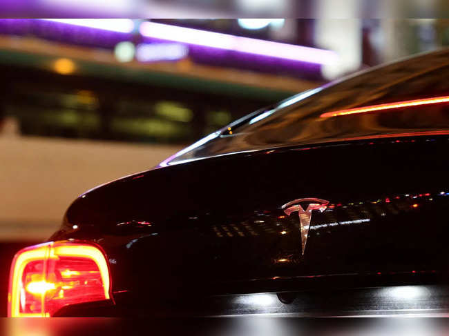 File photo of December 14, 2021: A Tesla logo is seen on a Parisian taxi car in Paris.