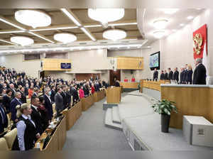 Russian lawmakers attend a session of the State Duma in Moscow