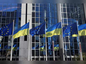 FILE PHOTO: Flags of European Union and Ukraine flutter outside EU Parliament building, in Brussels
