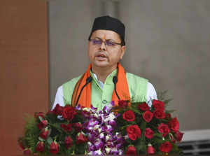 Dehradun: BJP leader Pushkar Singh Dhami takes oath as the Chief Minister of Utt...