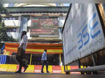 Mumbai: People walk past the Bombay Stock Exchange (BSE) building, in Mumbai. (P...