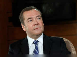 FILE PHOTO: Deputy Chairman of Russia's Security Council Medvedev gives an interview outside Moscow
