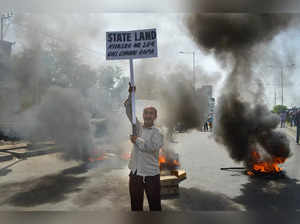Jammu: People burn tyres and block the Narwal Jammu & Kashmir National Highway, ...