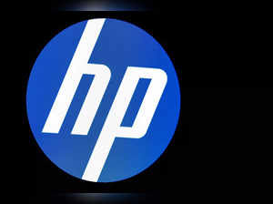 A screen displays the logo for HP Inc. at the NYSE in New York