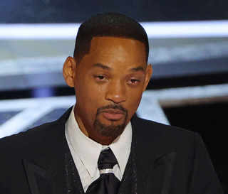 ‘I was out of line …’ Will Smith publicly apologises to Chris Rock for slapping him at the Oscars