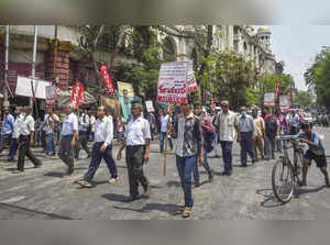 Kolkata_ Trade union activists participate in a rally in support of the two-day ....