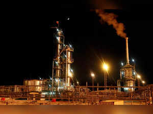 FILE PHOTO: A Russian state flag flies on the top of a diesel plant in the Irkutsk Oil Company-owned Yarakta Oil Field in Irkutsk Region