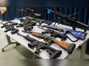 Weapons are displayed during a news conference in Los Angeles on Tu...