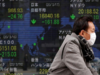 Asian shares slip on hawkish Fed, dollar stands tall