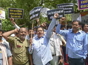 New Delhi: Cab drivers shout slogans during a protest at Jantar Mantar, in New D...