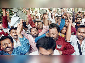 MSRTC workers at Sharad Pawar’s Breach Candy residence Silver Oak on Friday