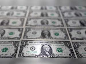 Illustration shows U.S. dollar banknotes