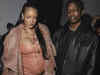 Pregnant Rihanna flashes skin wearing pink bralette that reveals her baby bump