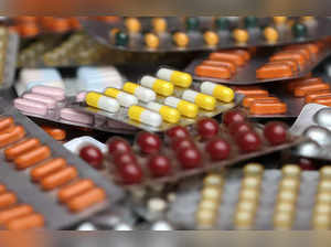 Illustration photo shows various medicine pills in their original packaging