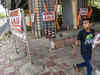 Saffron flags, 'Bhagwa JNU' posters put up outside JNU campus, Delhi Police initiates legal action