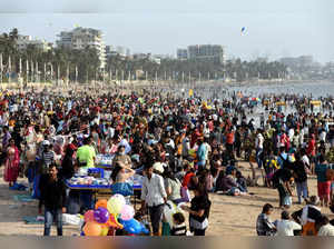 Mumbai: Crowded Juhu Beach after ease in COVID-19 restrictions, in Mumbai. (PTI ...