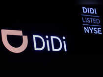 FILE PHOTO: A screen displays trading information for ride-hailing giant Didi Global on the floor of the NYSE in New York