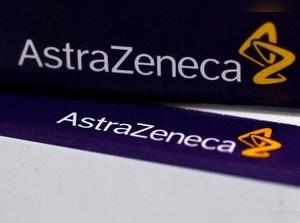 The logo of AstraZeneca is seen on medication packages in a pharmacy in London, Britain