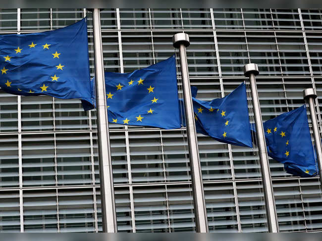 FILE PHOTO: EU flags fly outside the European Commission headquarters in Brussels