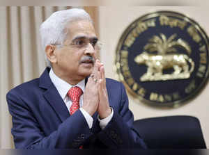The Reserve Bank of India (RBI) Governor Shaktikanta Das greets the media as he arrives at a news conference after a monetary policy review in Mumbai