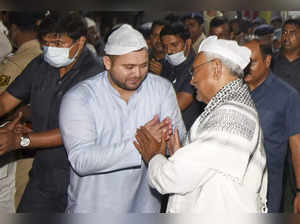 Patna: Bihar Chief Minister Nitish Kumar with RJD leader Tejashwi Yadav at an If...