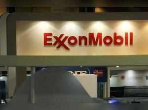 FILE PHOTO: Logo of the Exxon Mobil Corp is seen at the Rio Oil and Gas Expo and Conference in Rio de Janeiro