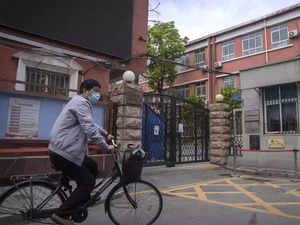 Beijing orders schools closed in tightening of virus rules