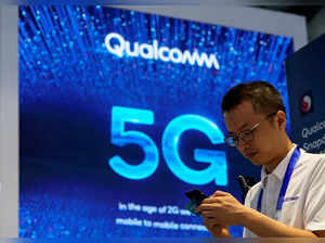 FILE PHOTO: Signs of Qualcomm and 5G are pictured at Mobile World Congress (MWC) in Shanghai