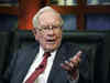 Warren Buffett reveals big investments, rails against Wall St excess at Berkshire meeting