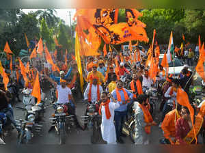 Mirzapur: Vishva Hindu Parishad (VHP) and Bajrang Dal activists take out a bike ...