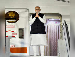 Paris: Prime Minister Narendra Modi waves as he departs for Delhi, from Paris. (...