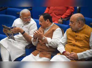 New Delhi: Prime Minister Narendra Modi interacts with BJP National President JP...