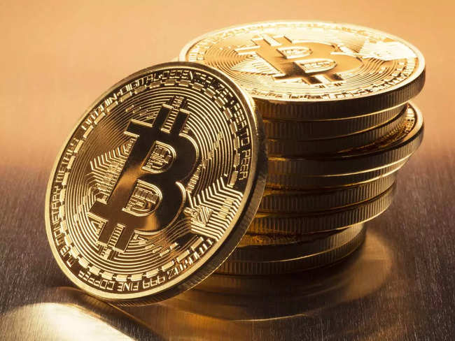 Bitcoin falls to 10-month low as stock markets tumble