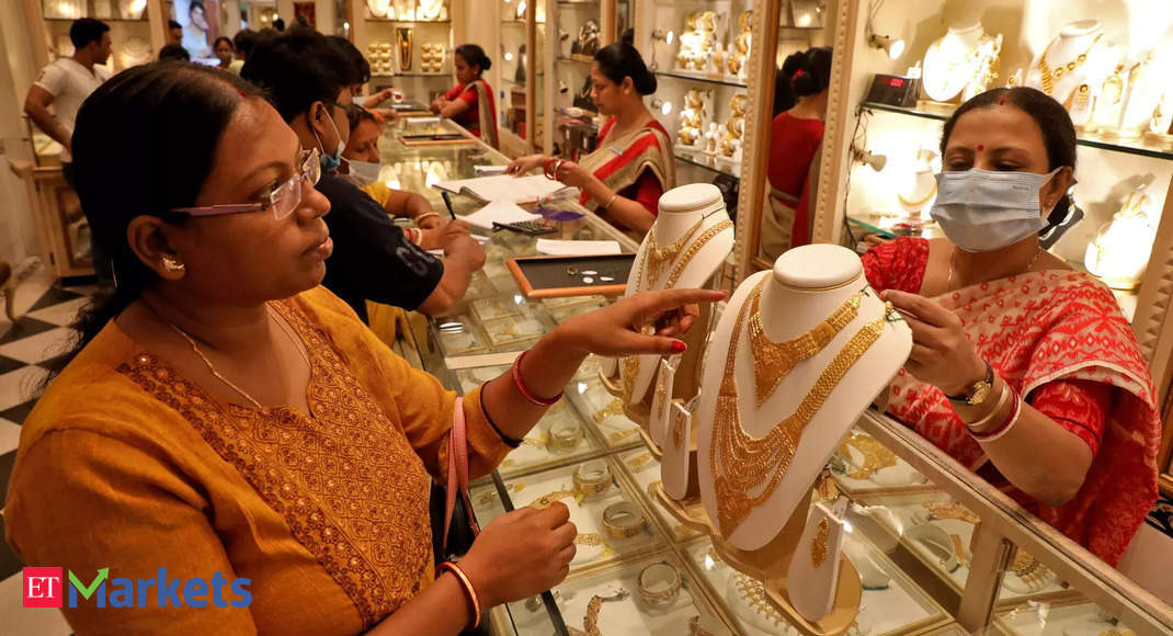 Gold rate today: Yellow metal extends slide; silver nears Rs 60,000