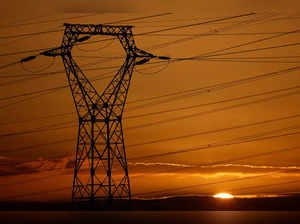 FILE PHOTO: A pylon of high-tension electricity power lines at sunset in Cordemais