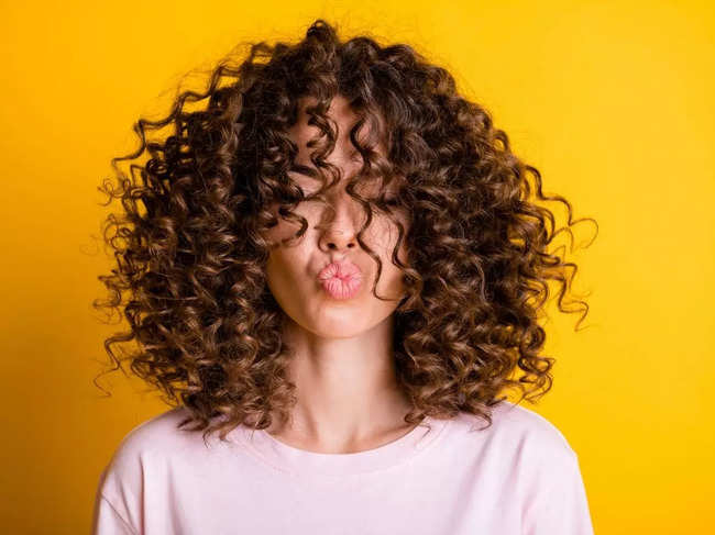 Are your locks losing shine in this weather? Tips to keep your curls bouncy  and healthy this season - The Economic Times