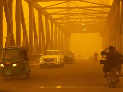 ​Sand covers cars and buildings