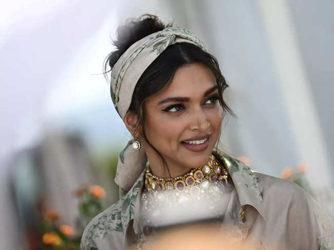 ​Deepika Padukone's baggy Mysore silk shirt featured a digital rendering of hand-painted vintage flora inspired by paintings made by the Sabyasachi Art Foundation. ​
