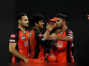 Mumbai: Umran Malik of Sunrisers Hyderabad celebrates with teammates, the wicket...