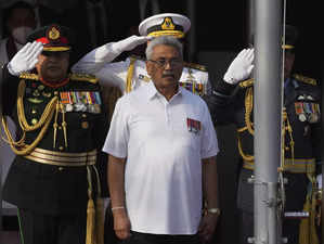 Colombo: FILE- Sri Lankan president Gotabaya Rajapaksa sings the national anthem...