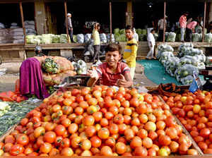 New Delhi, Apr 13 (ANI): A vendor selling tomatoes at Ghazipur Sabji Mandi as ve...