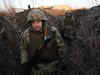 Russian, Ukrainian troops fight block by block in key city