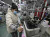 China factory activity shrinks at slower pace in May